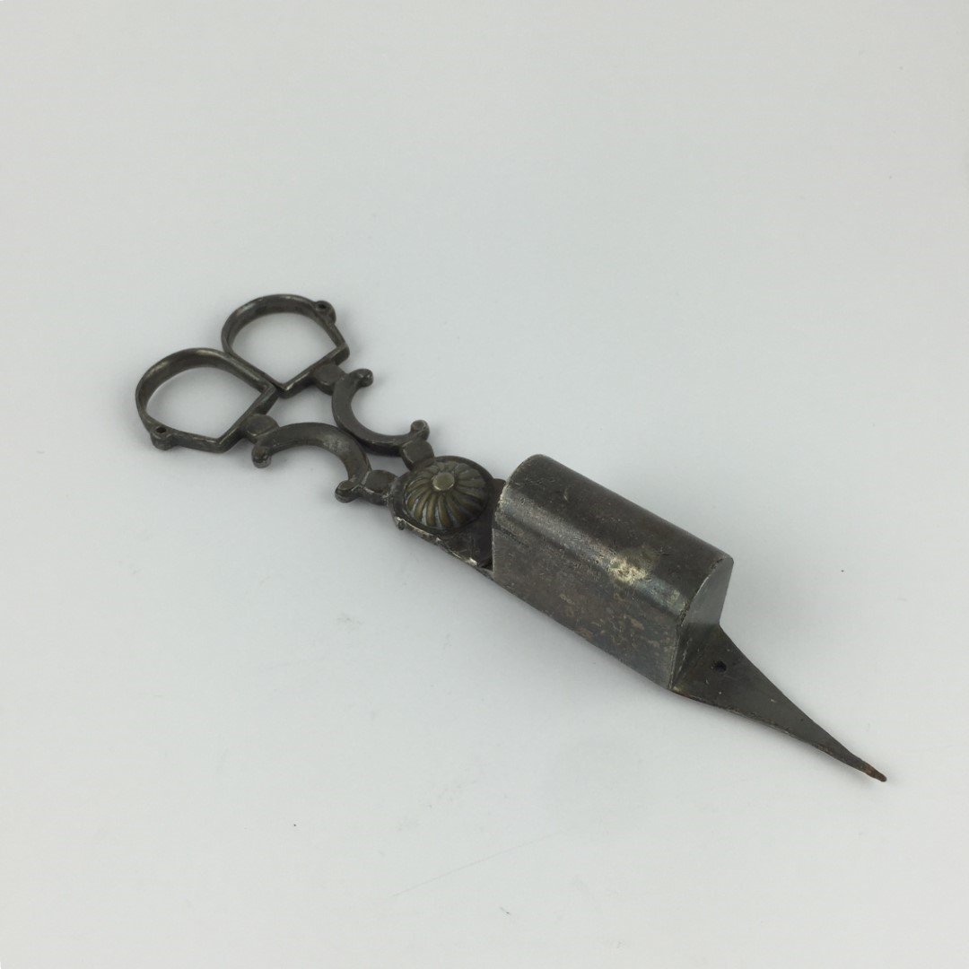 Tijera despabiladora