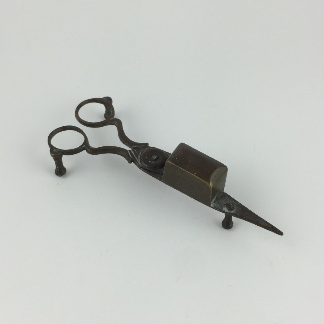 Tijera despabiladora