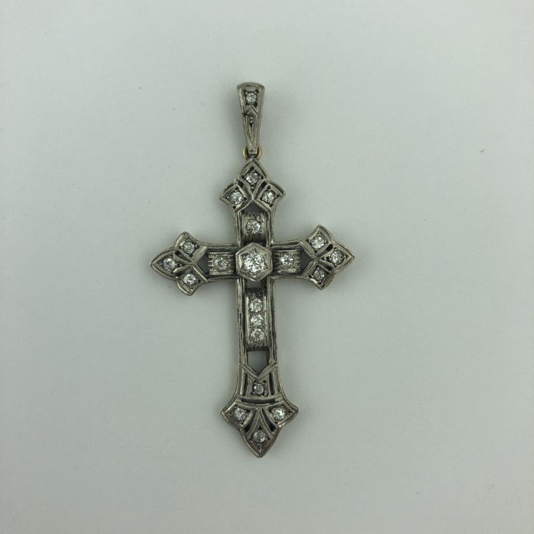 Cruz oro 18 K y brillantes