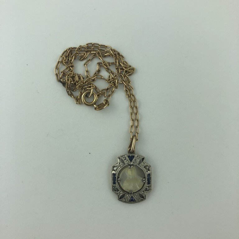 Cadena y medalla en oro