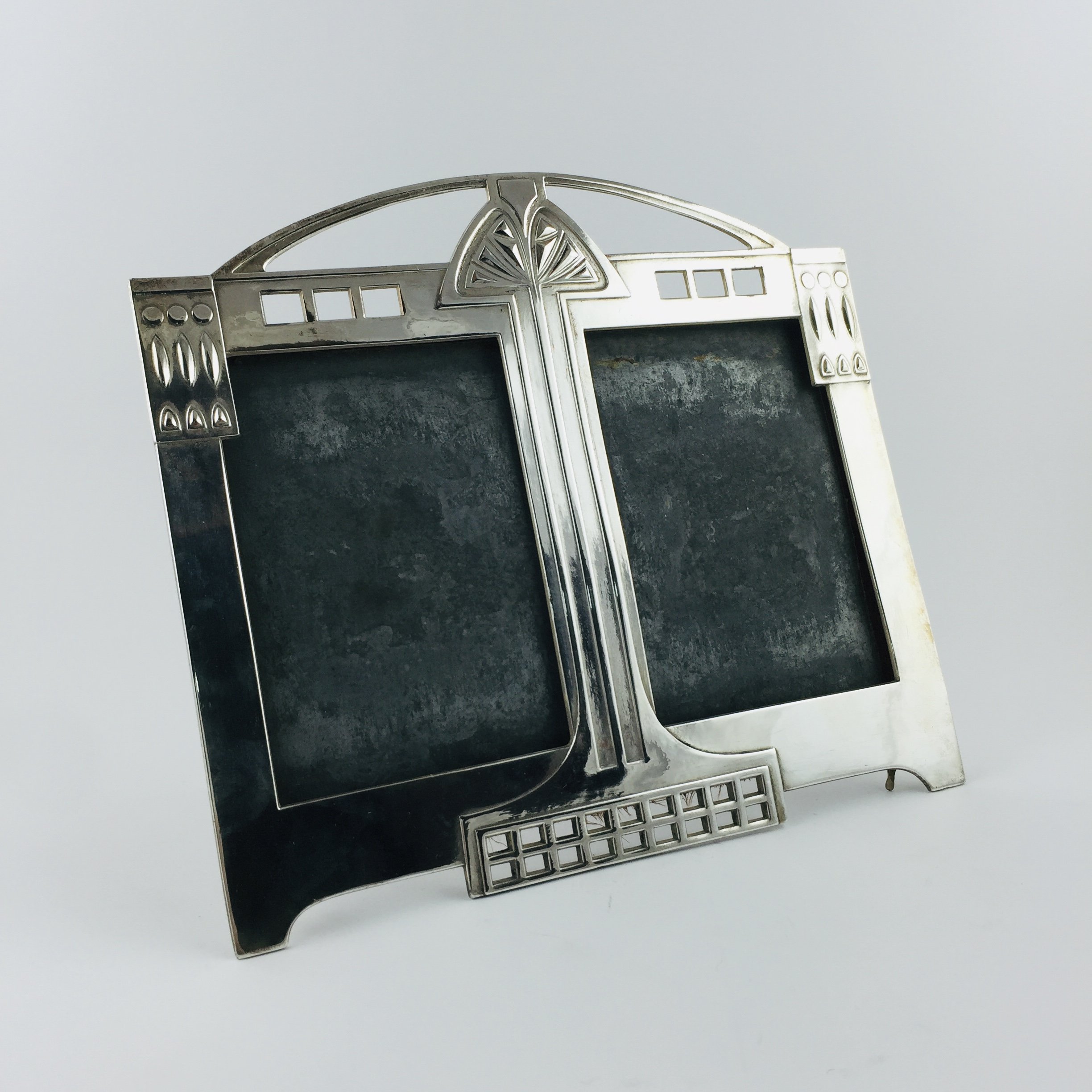 Portrretrato en metal plateado