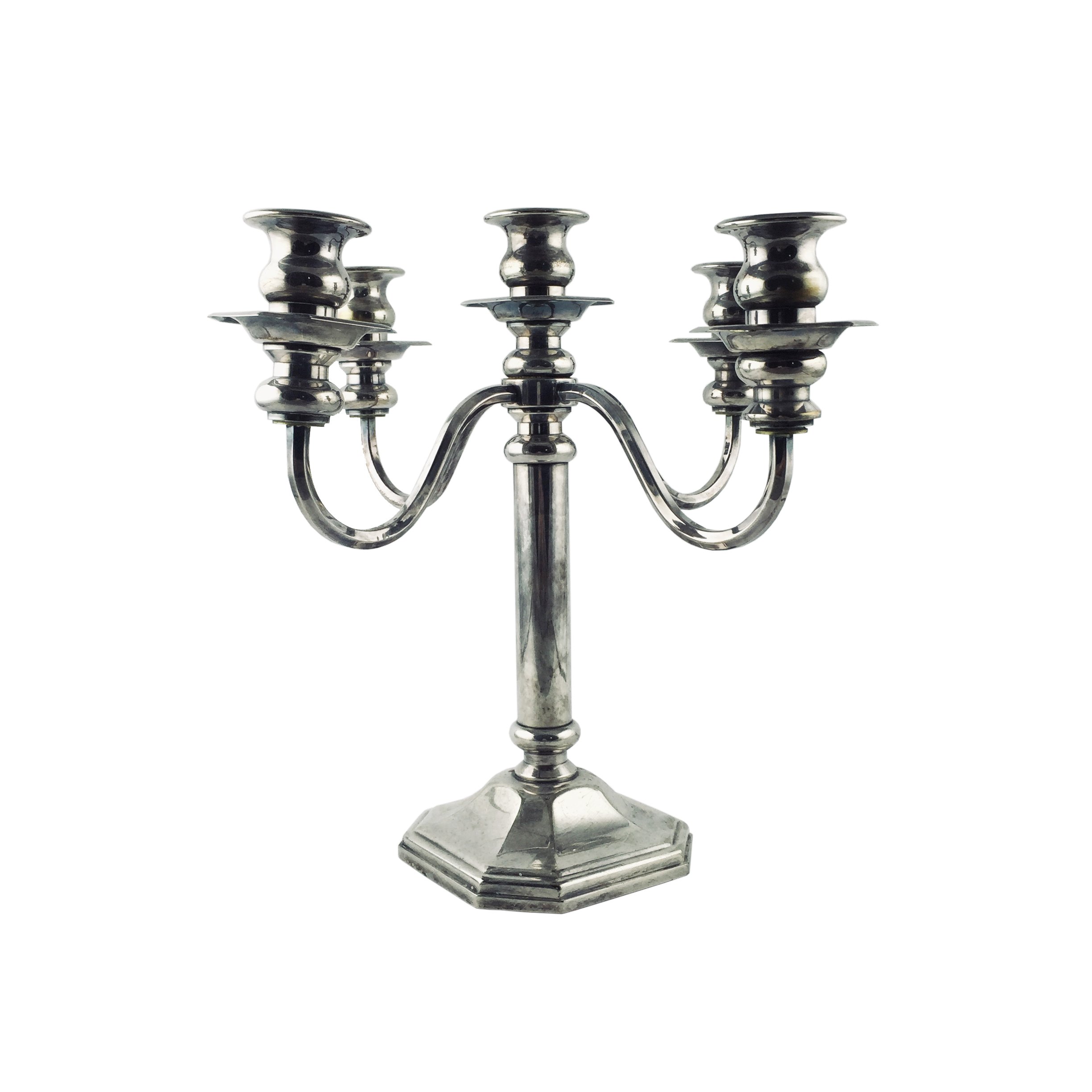 Par de candelabros en metal plateado