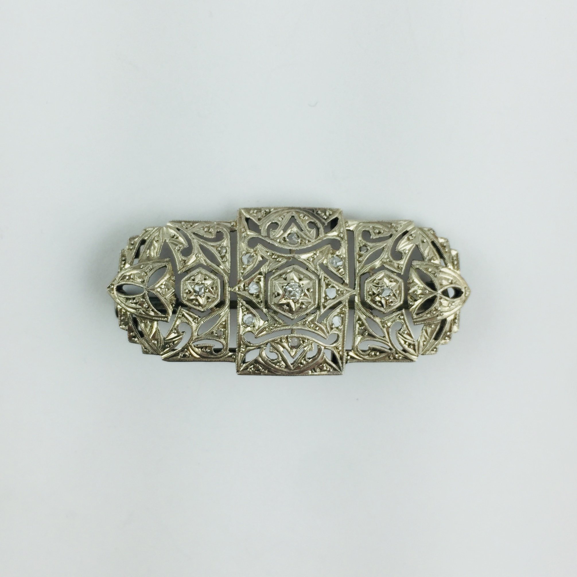 Plaqueta art decó oro, brillante y diamantes