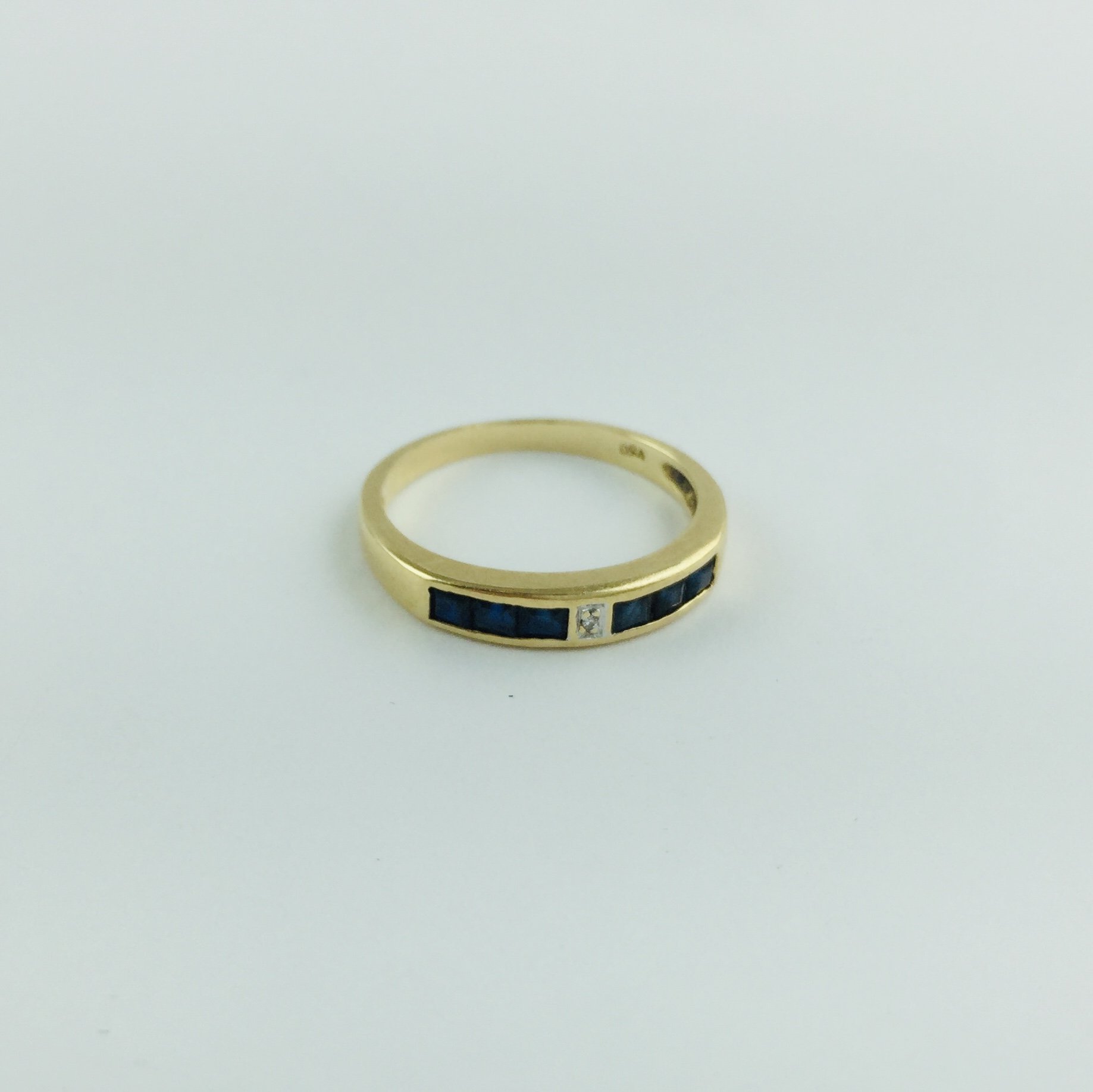 Anillo oro 18 K, brillante y zafiros