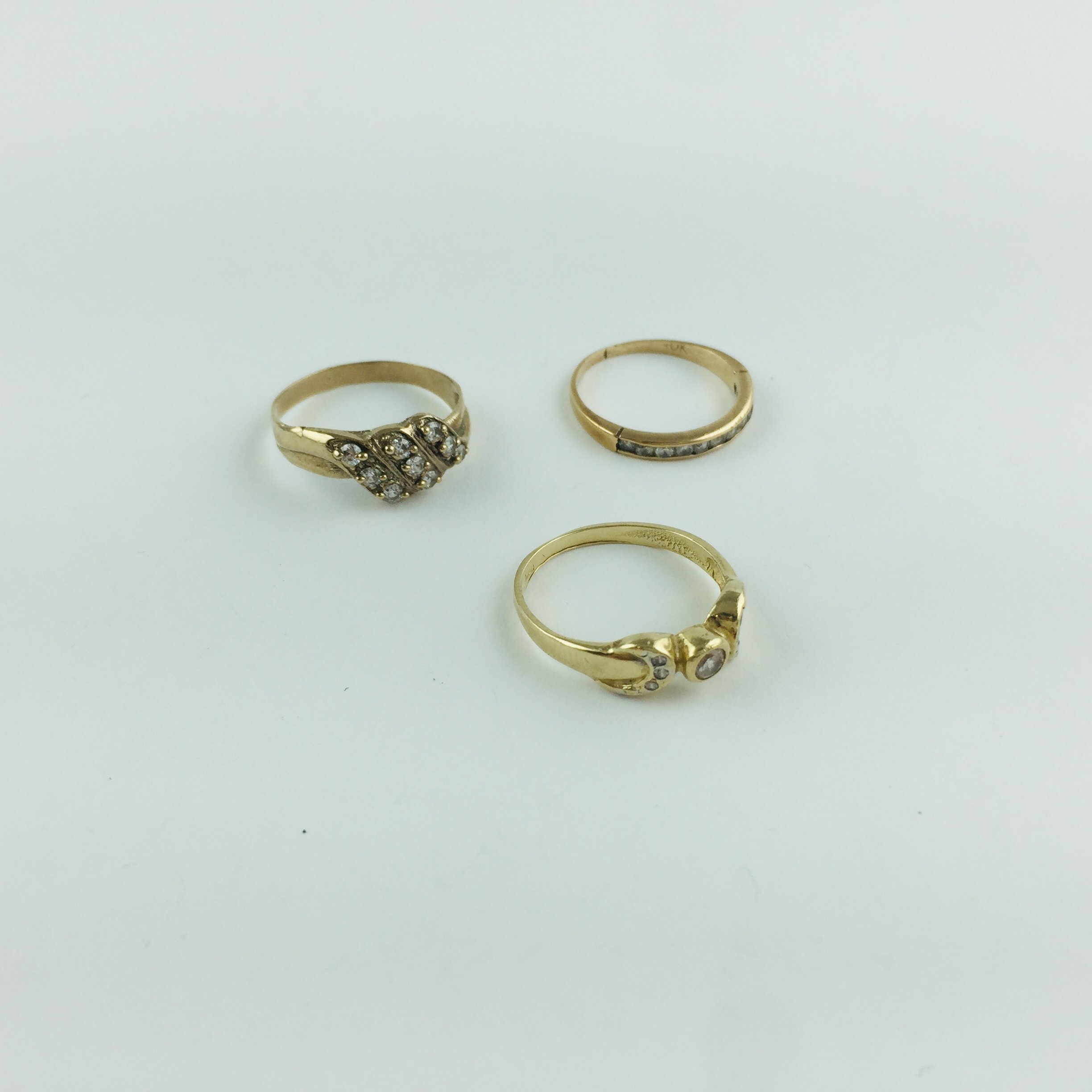 Anillos en oro 18 K y zirconias