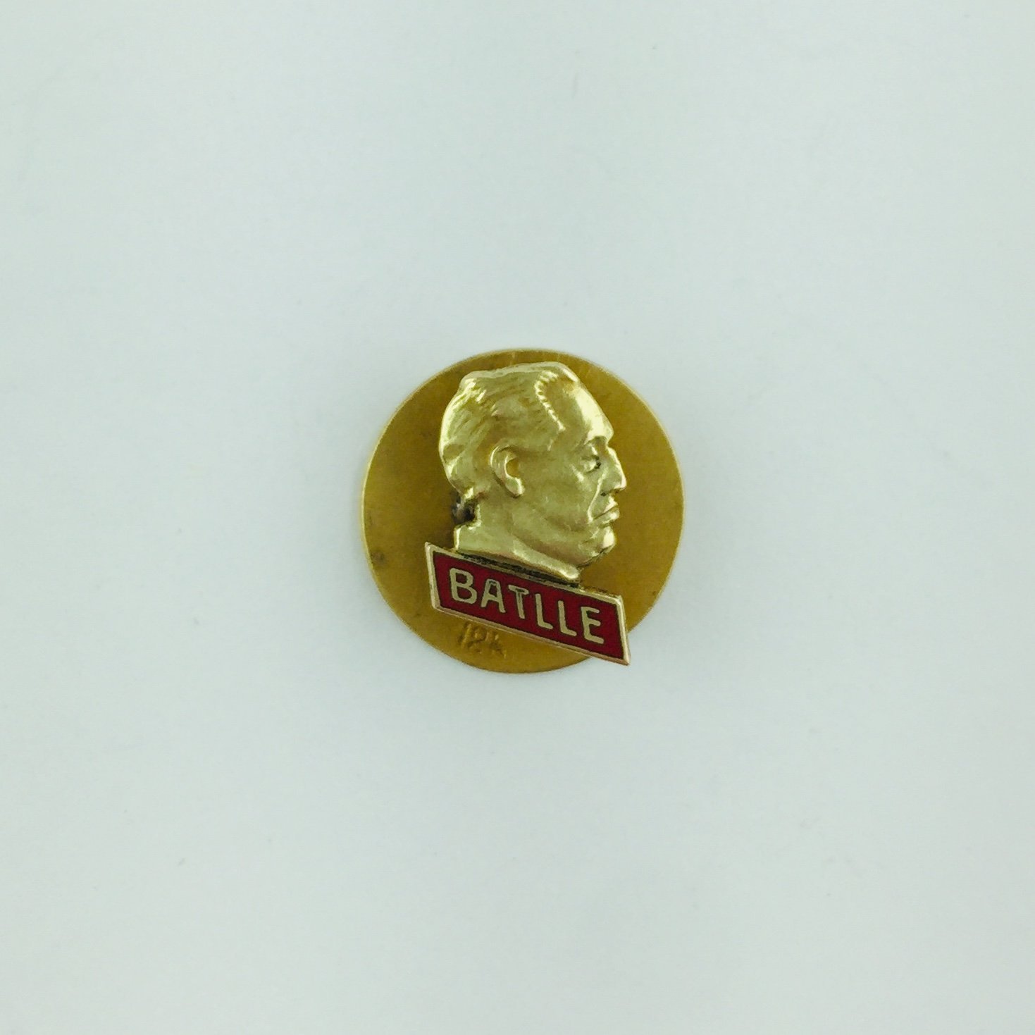 Pin solpaero oro