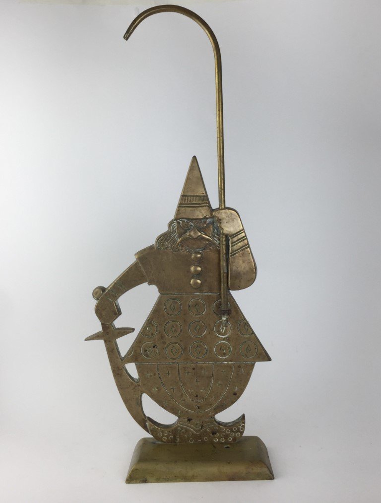 Tope de puerta en bronce