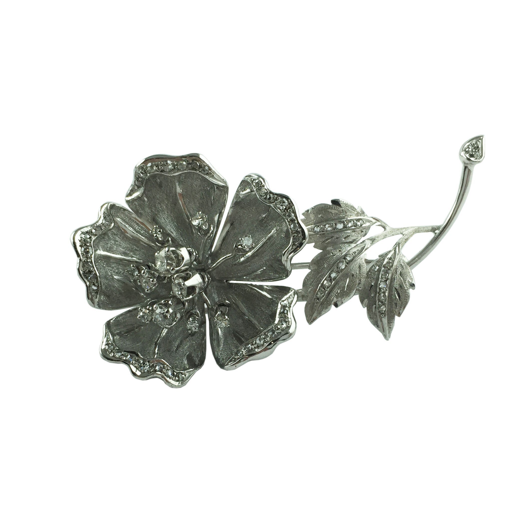 Prendedor oro 18 K, diamantes y brillantes