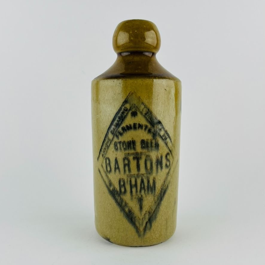 Tres botellas inglesas en gres