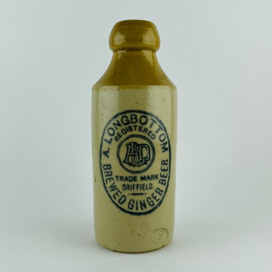 Tres botellas inglesas en gres