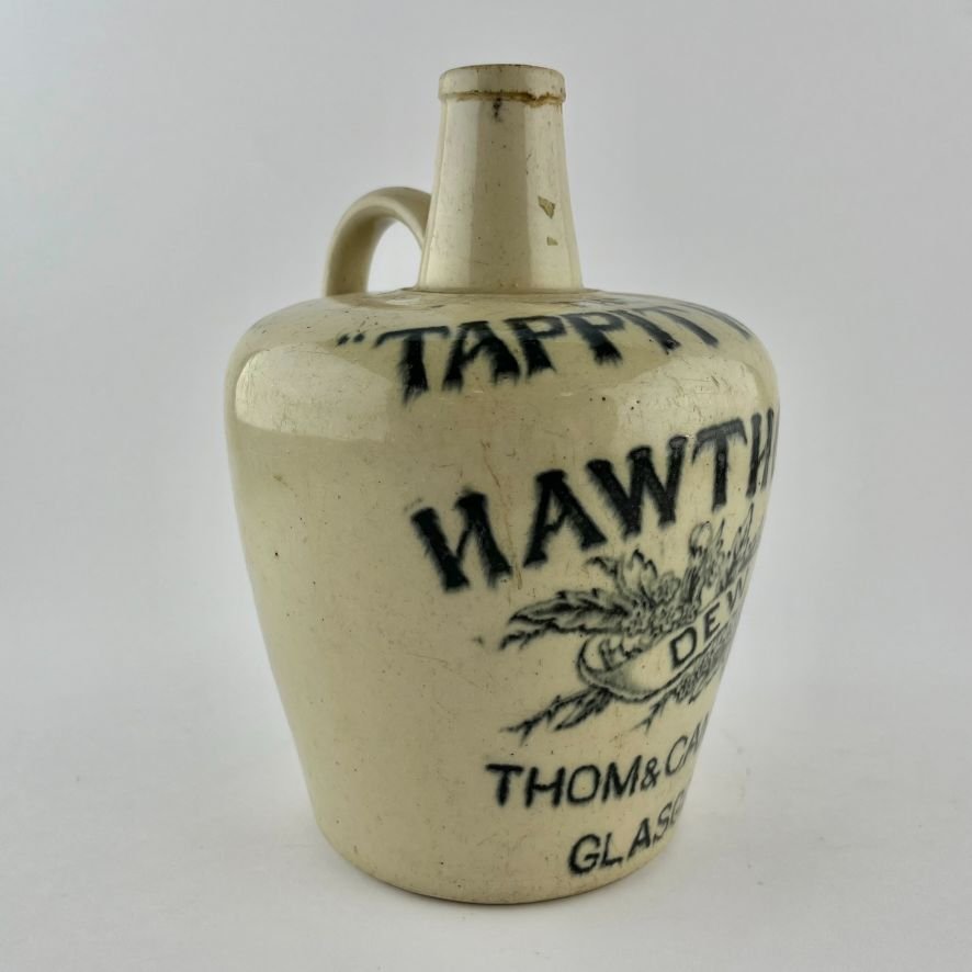 Botella de whisky en gres