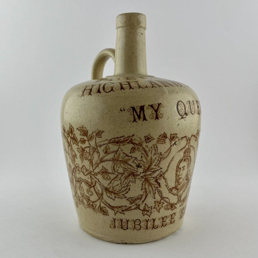 Botella de whisky en gres