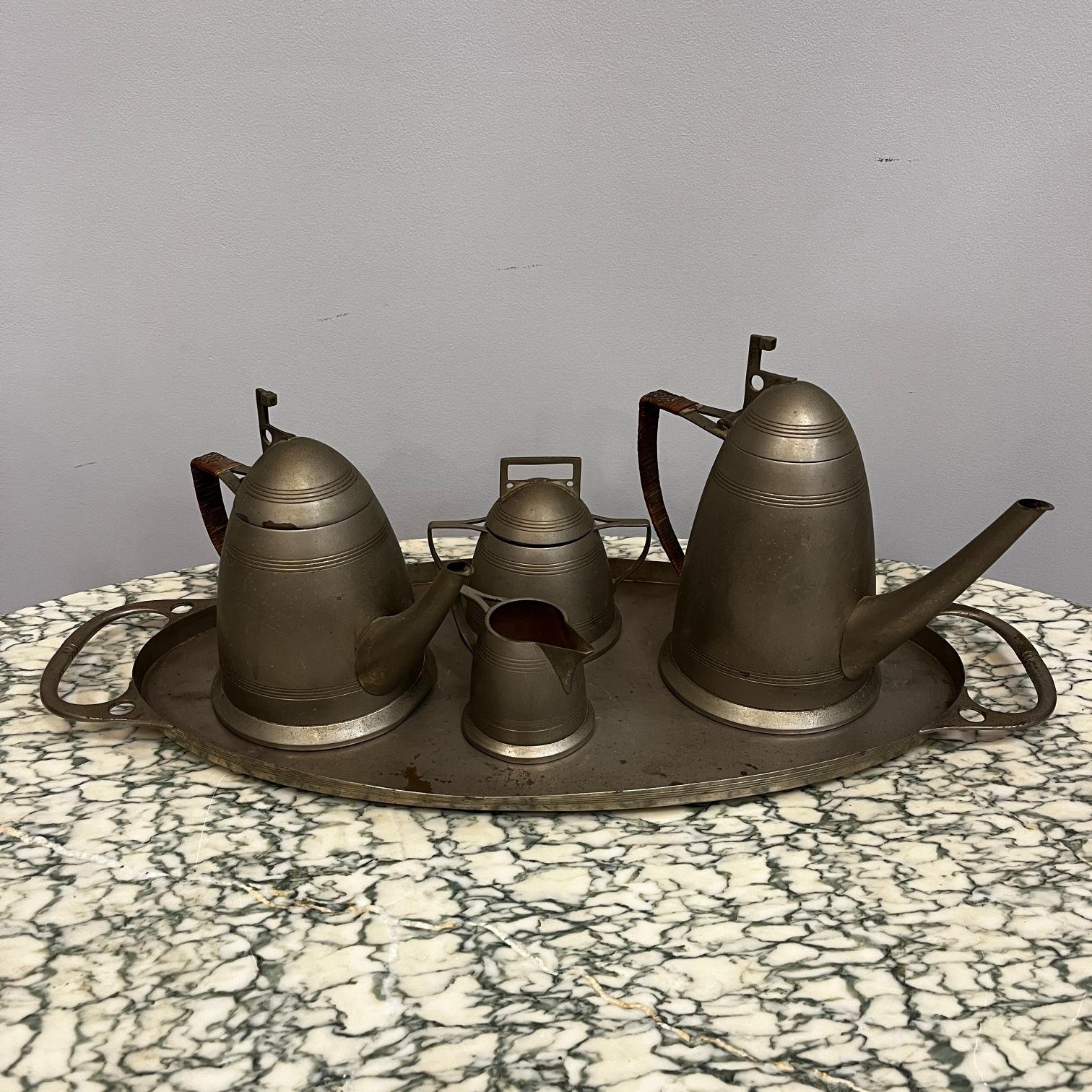 Juego para té y café en metal plateado