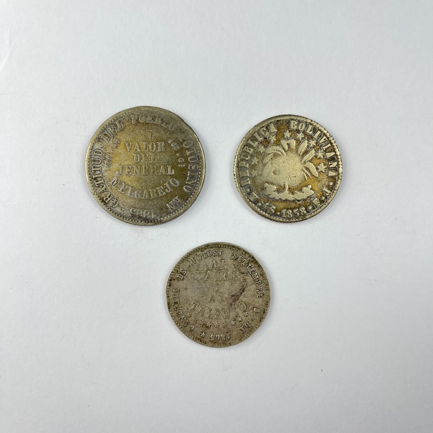 Moneda y medallas bolivianas en plata