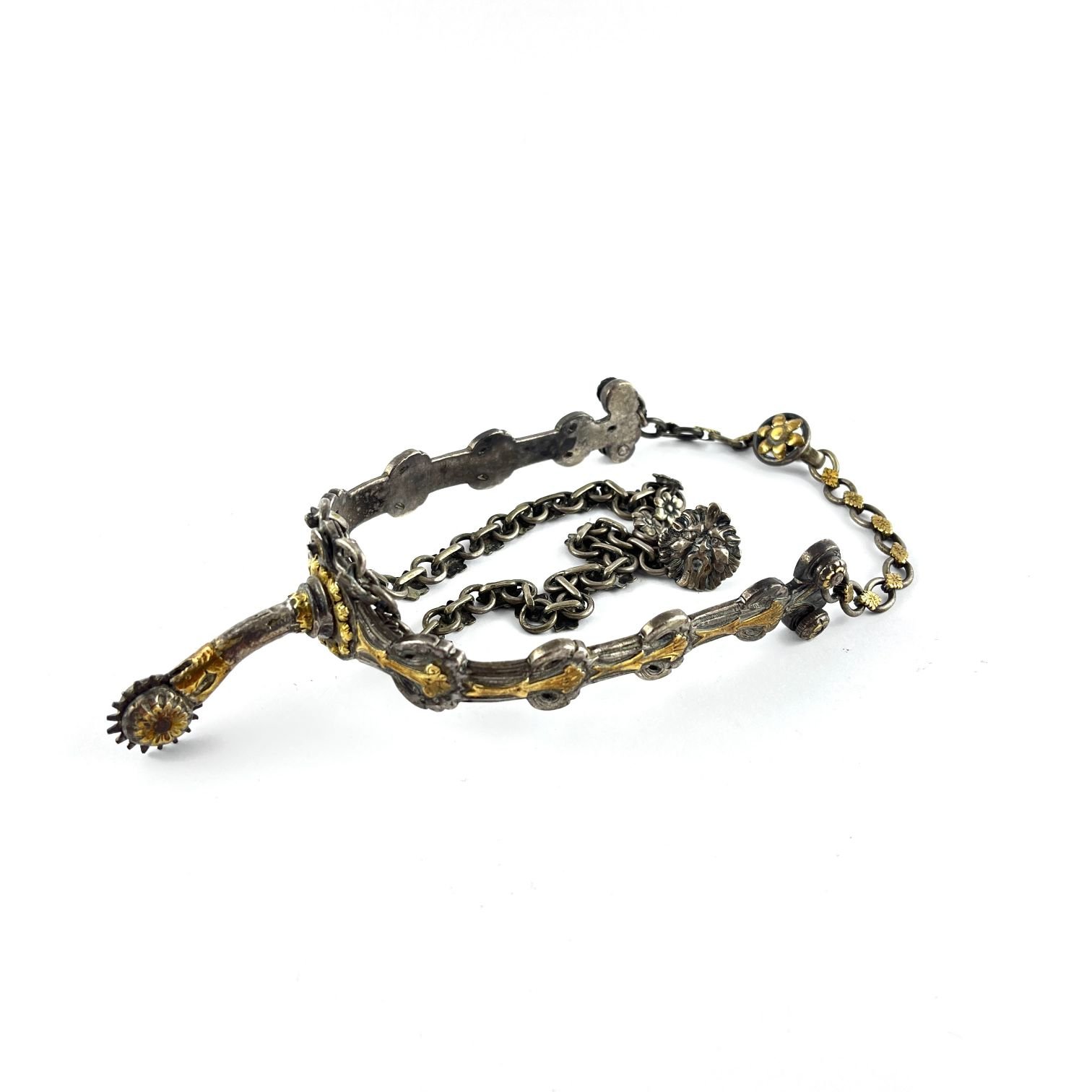 Espuelín en plata y oro