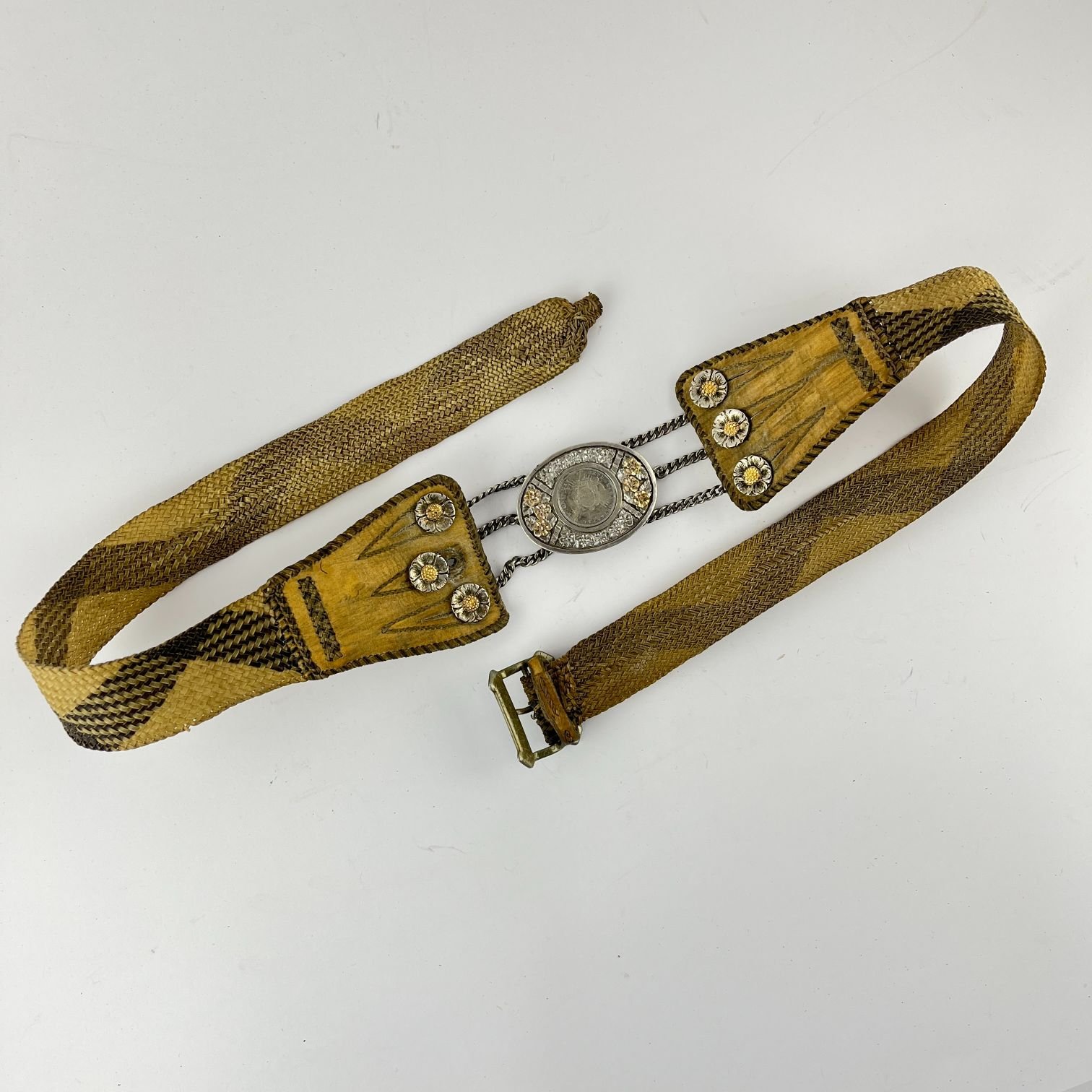 Rastra en plata, oro y cuero