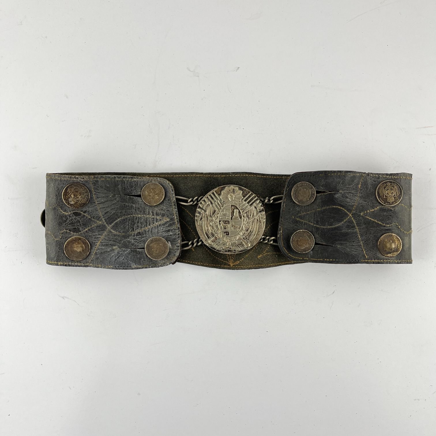 Rastra en plata y cuero