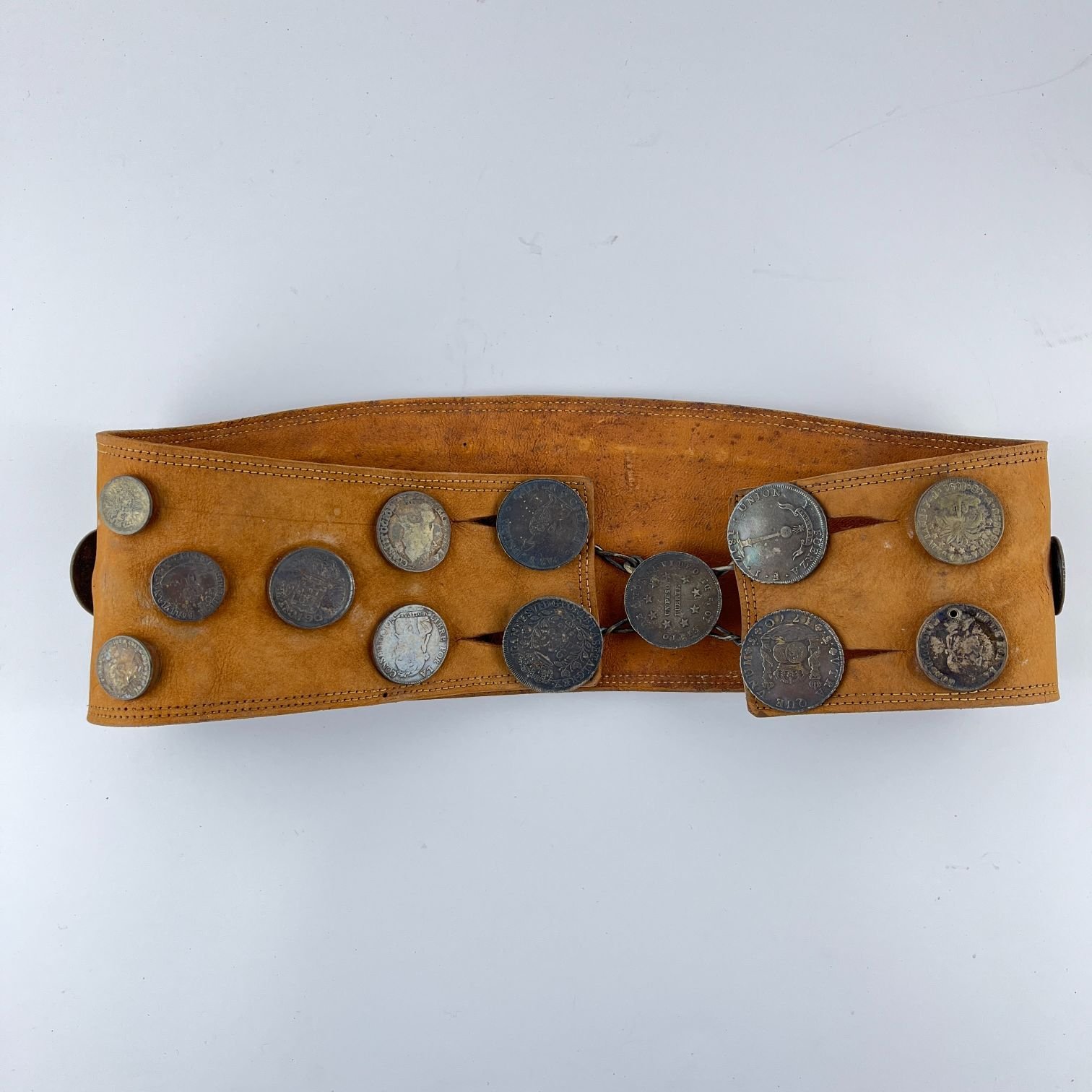 Rastra en plata y cuero