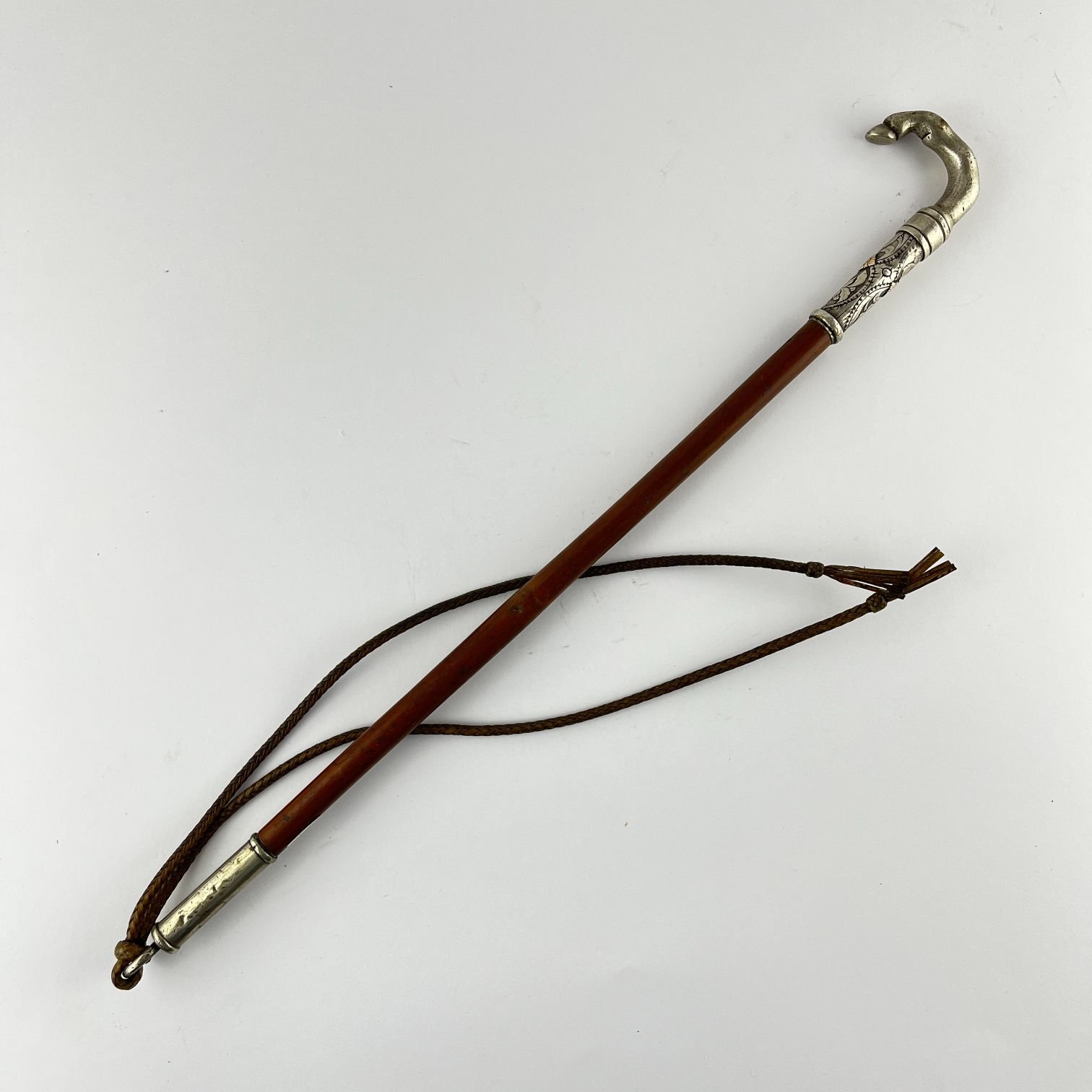 Rebenque en cuero, plata y oro