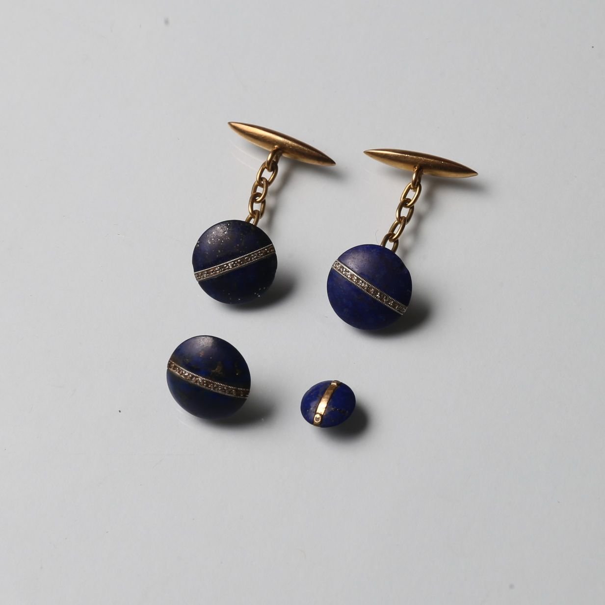 Gemelos y botón solapero oro, lapislázuli y diamante