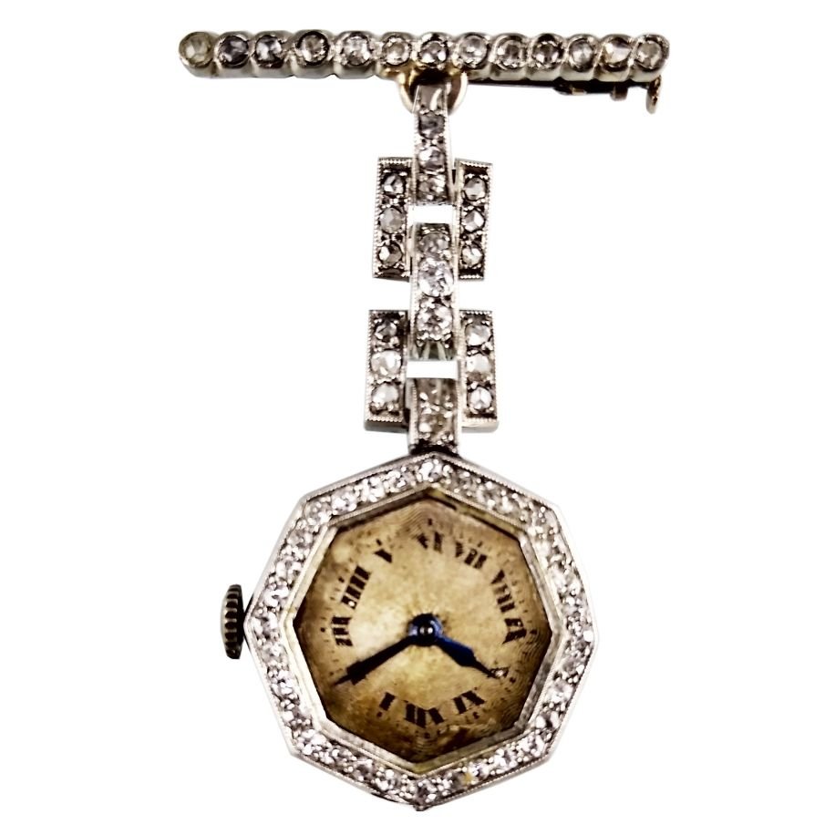 Reloj prendedor art decó platino y diamantes