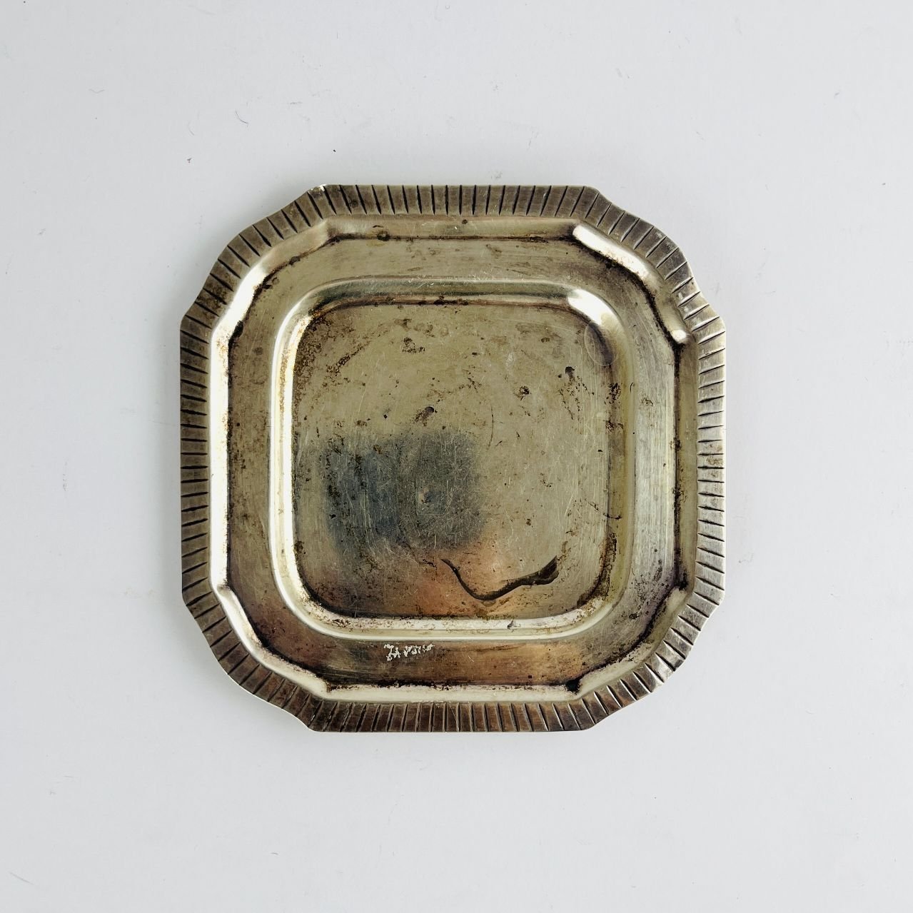 Posabotellas en plata