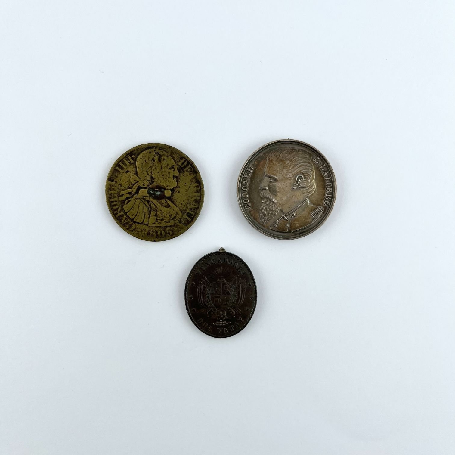 Dos medallas uruguayas y un botón gaucho