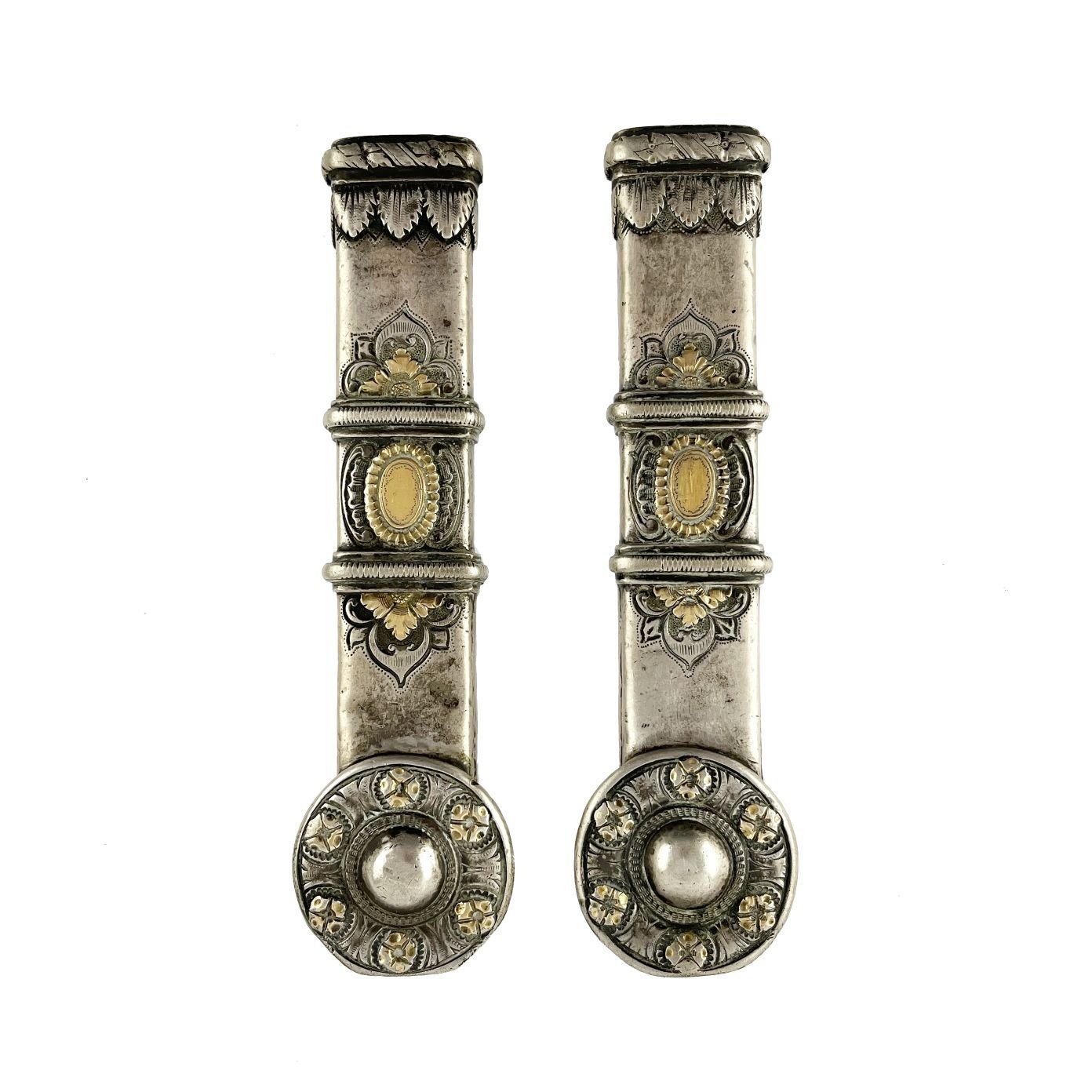 Par de pasadores en plata y oro