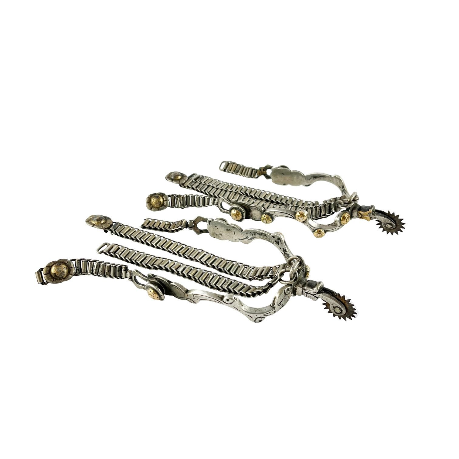 Par de espuelines en plata y oro