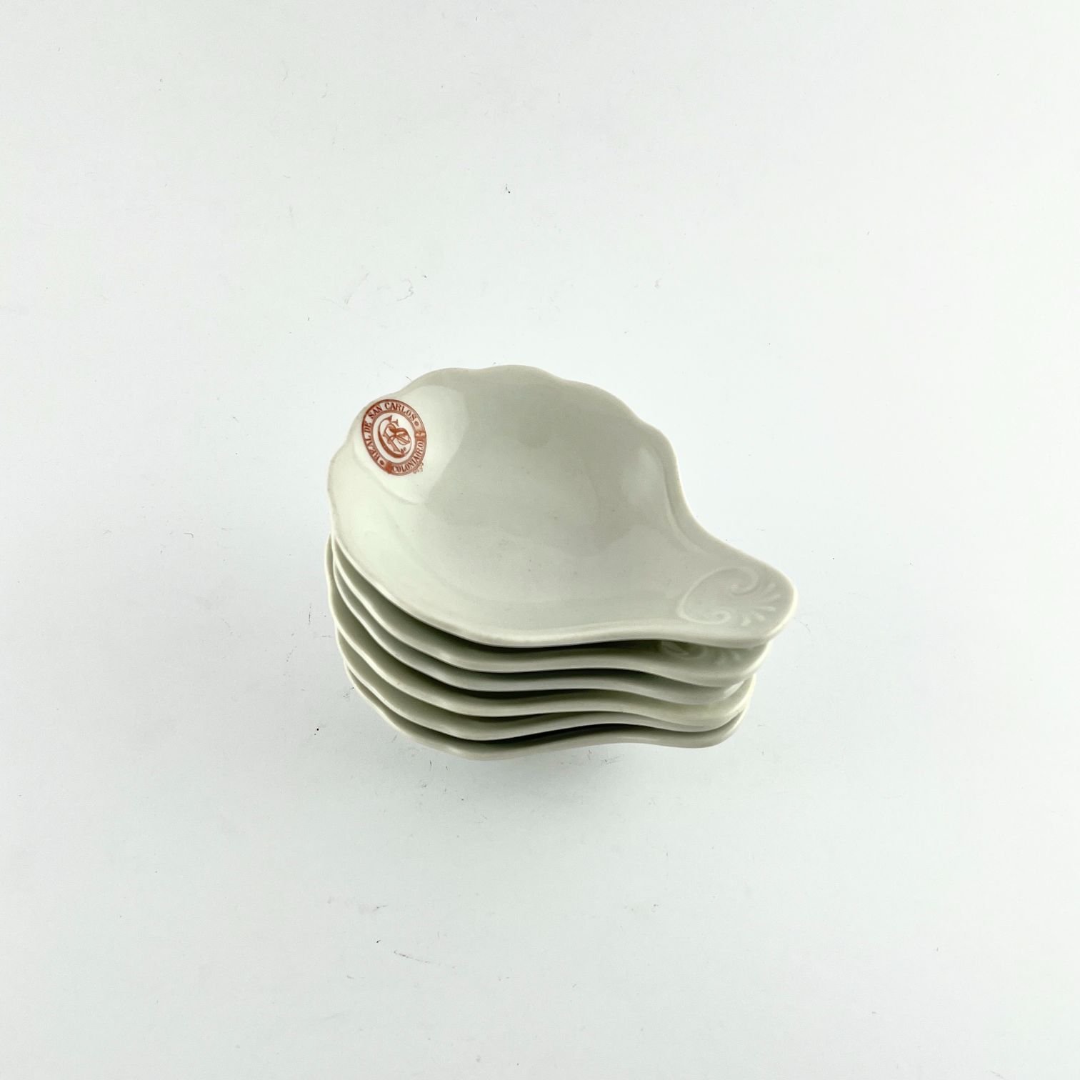 Seis coquillas en porcelana Real de San Carlos