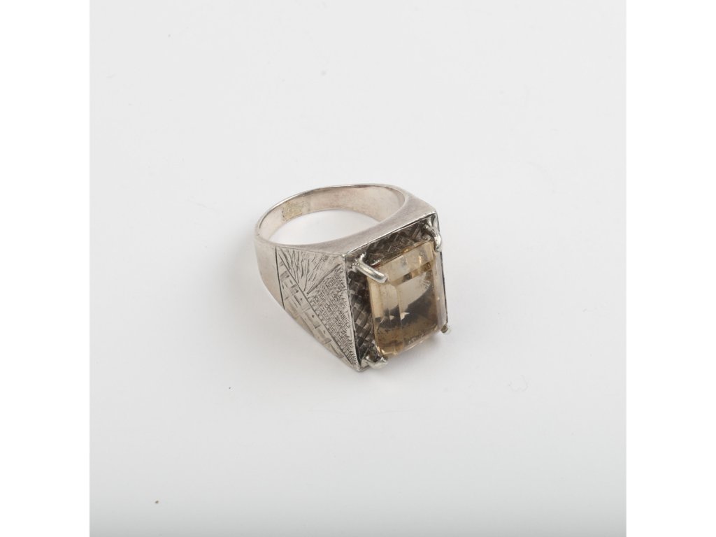 Anillo oro 18 y topacio