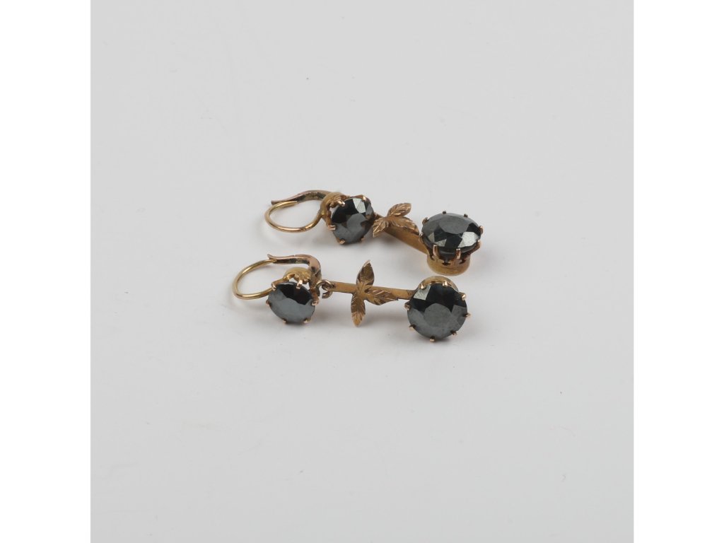 Caravanas oro y azabache