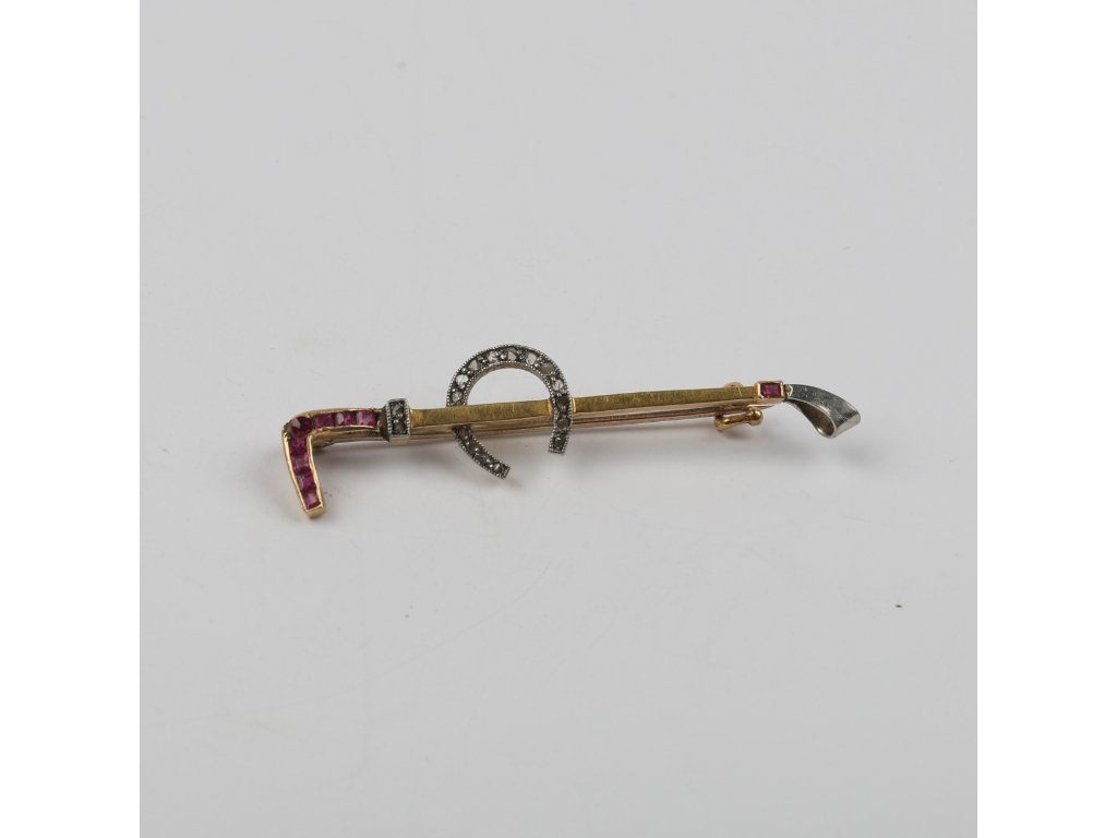 Prendedor oro 18 K, rubíes y diamantes