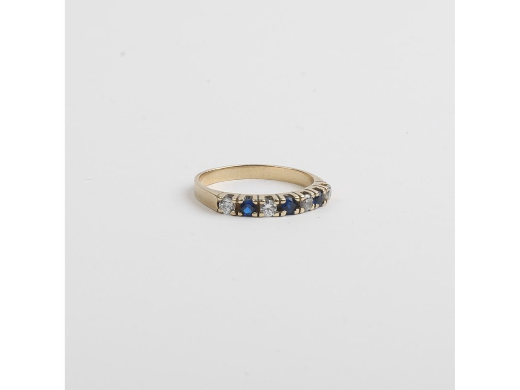 Anillo oro 18 K, zirconias y zafiros