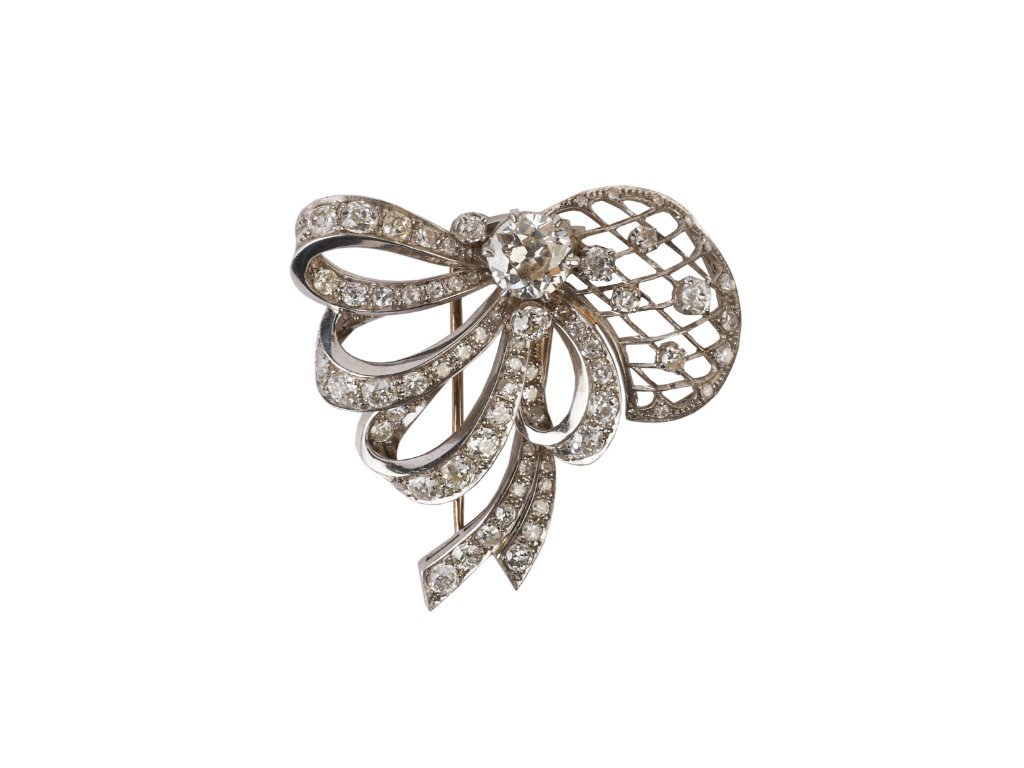 Prendedor platino y brillantes