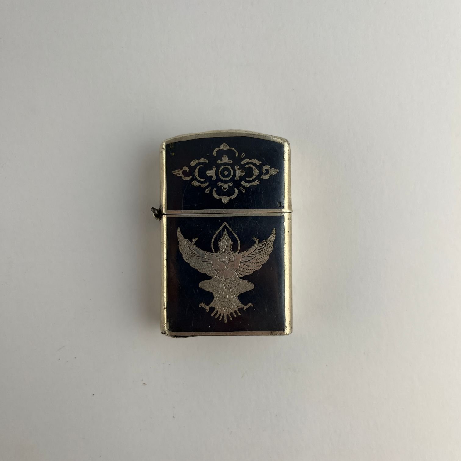 Encendedor siamés tipo Zippo