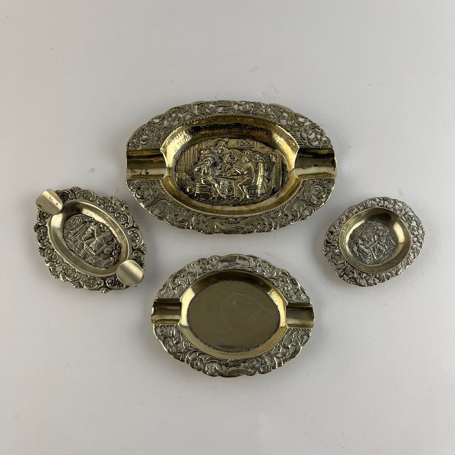 Cuatro piezas en plata