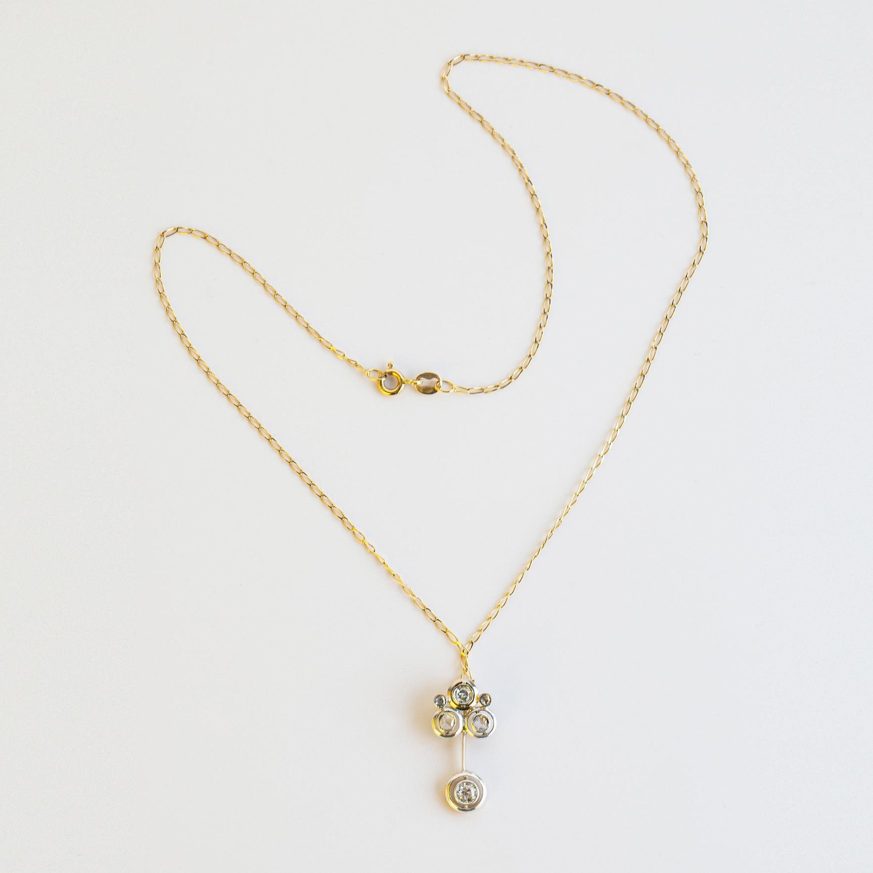 Cadena oro 18 K, brillantes y diamantes