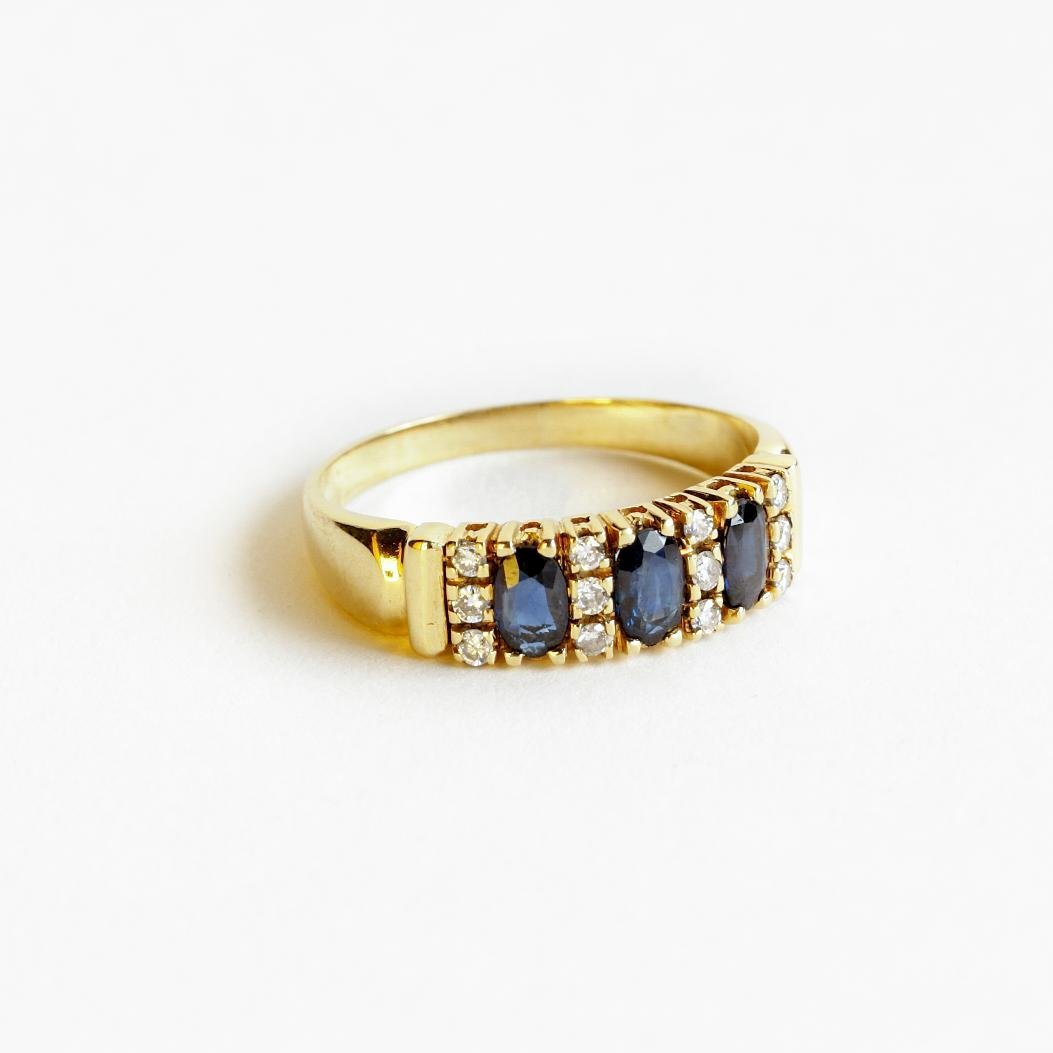Anillo oro 18 K, zafiros y brillantes