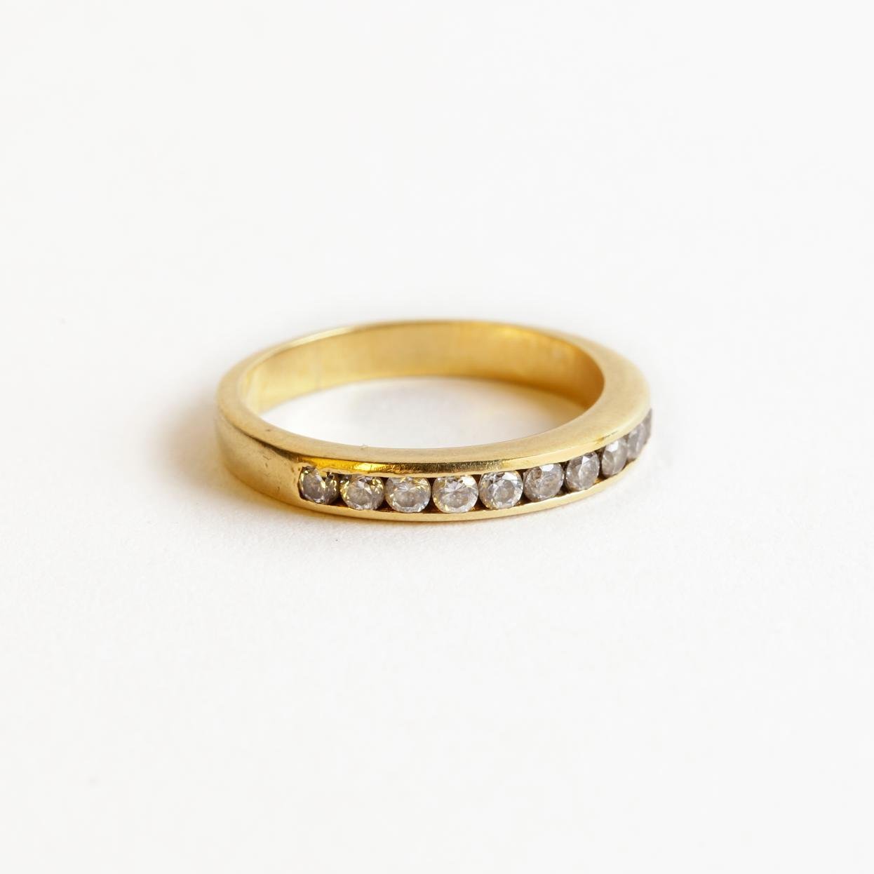 Anillo oro 18 K y zirconias