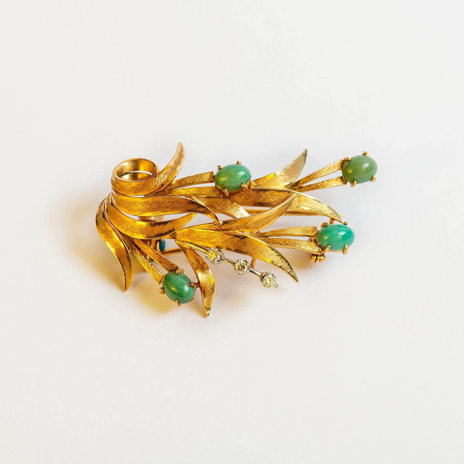 Prendedor oro 18 K, turquesas y brillantes