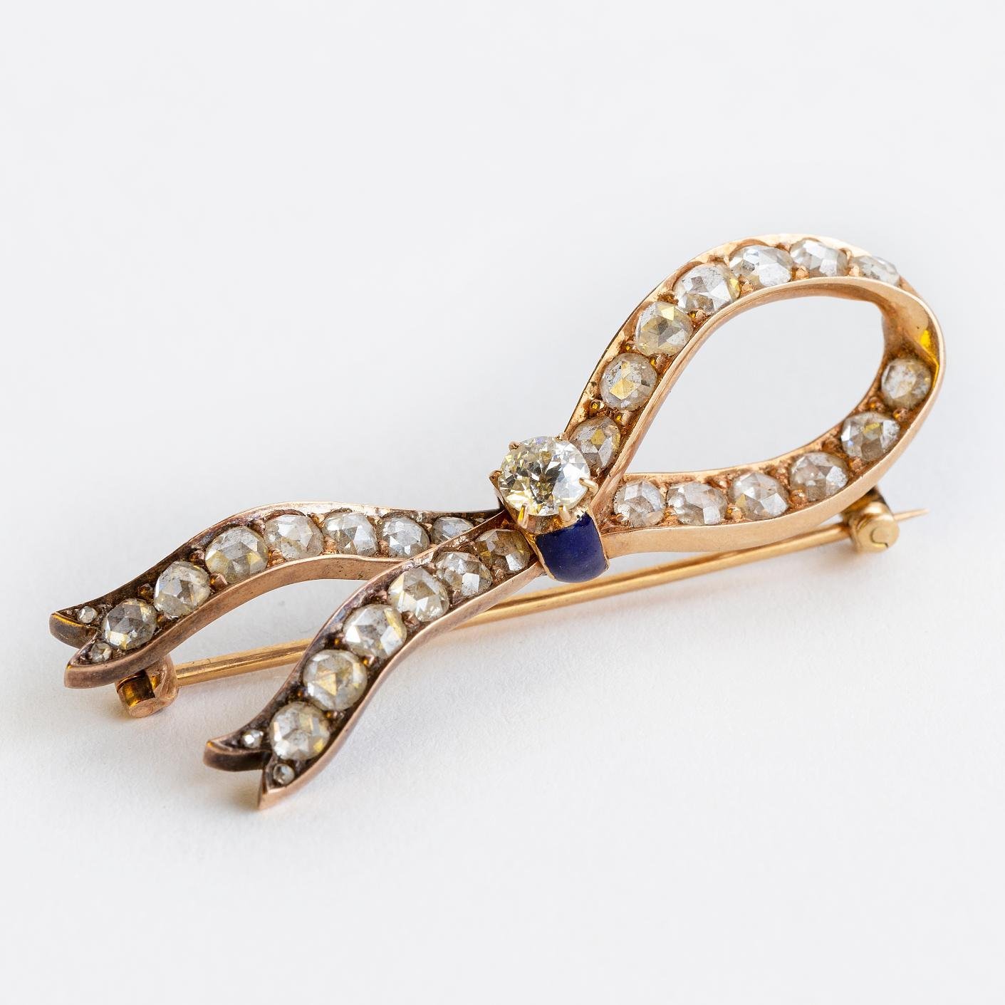 Prendedor oro, diamantes y esmalte