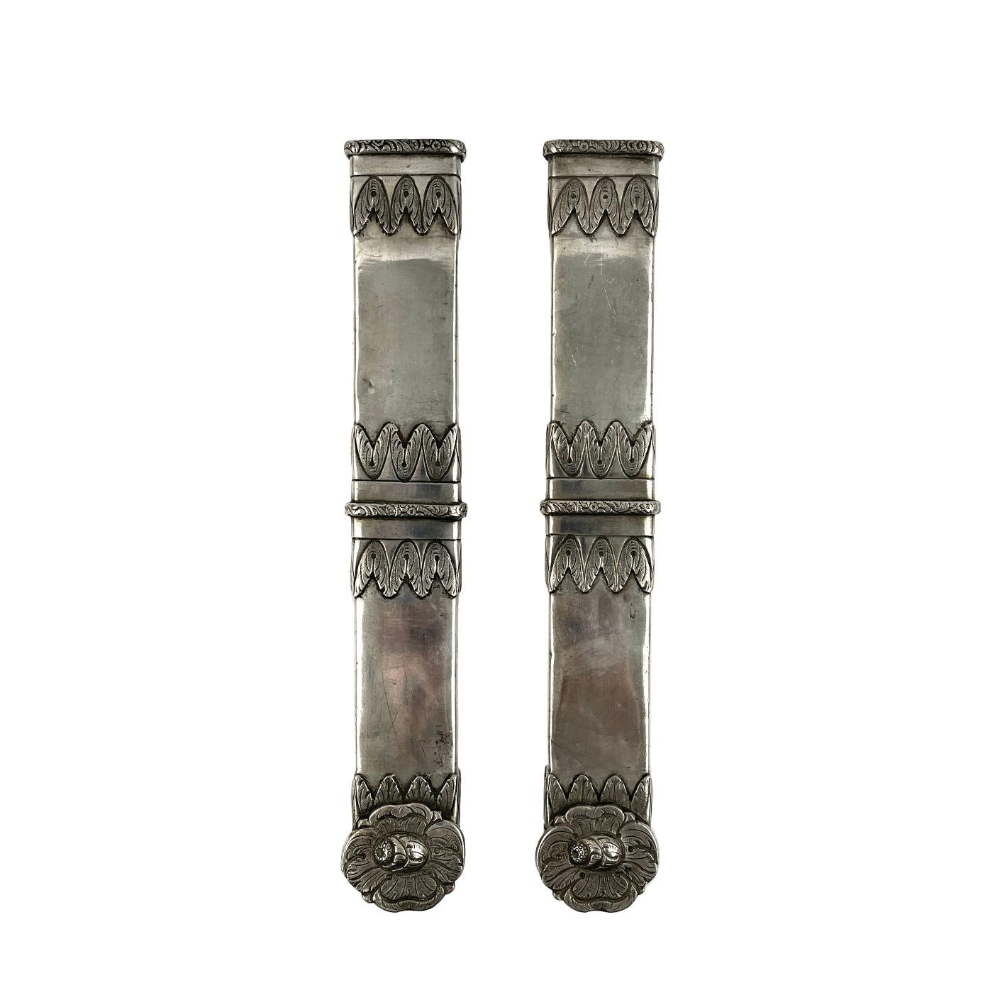 Par de pasadores en plata