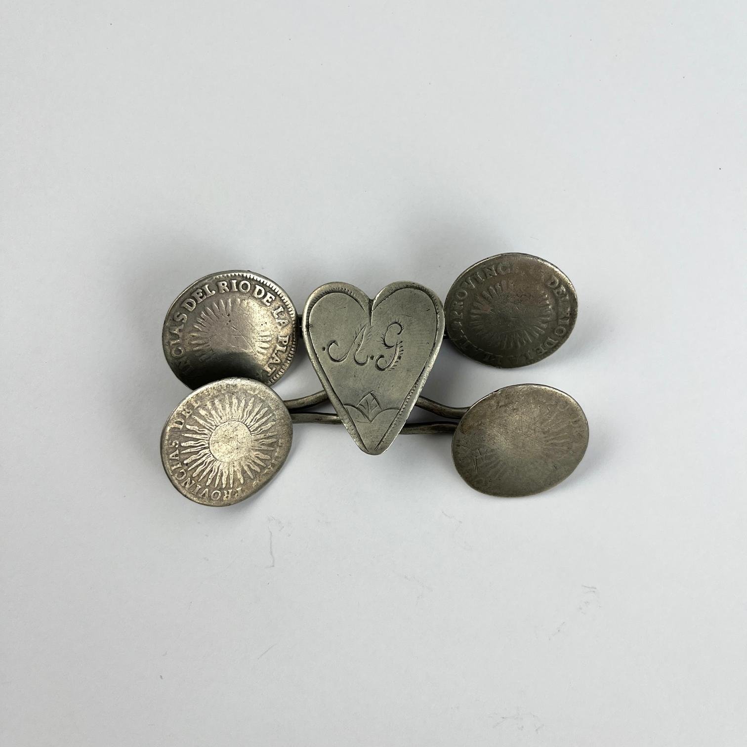 Pequeña rastra en plata