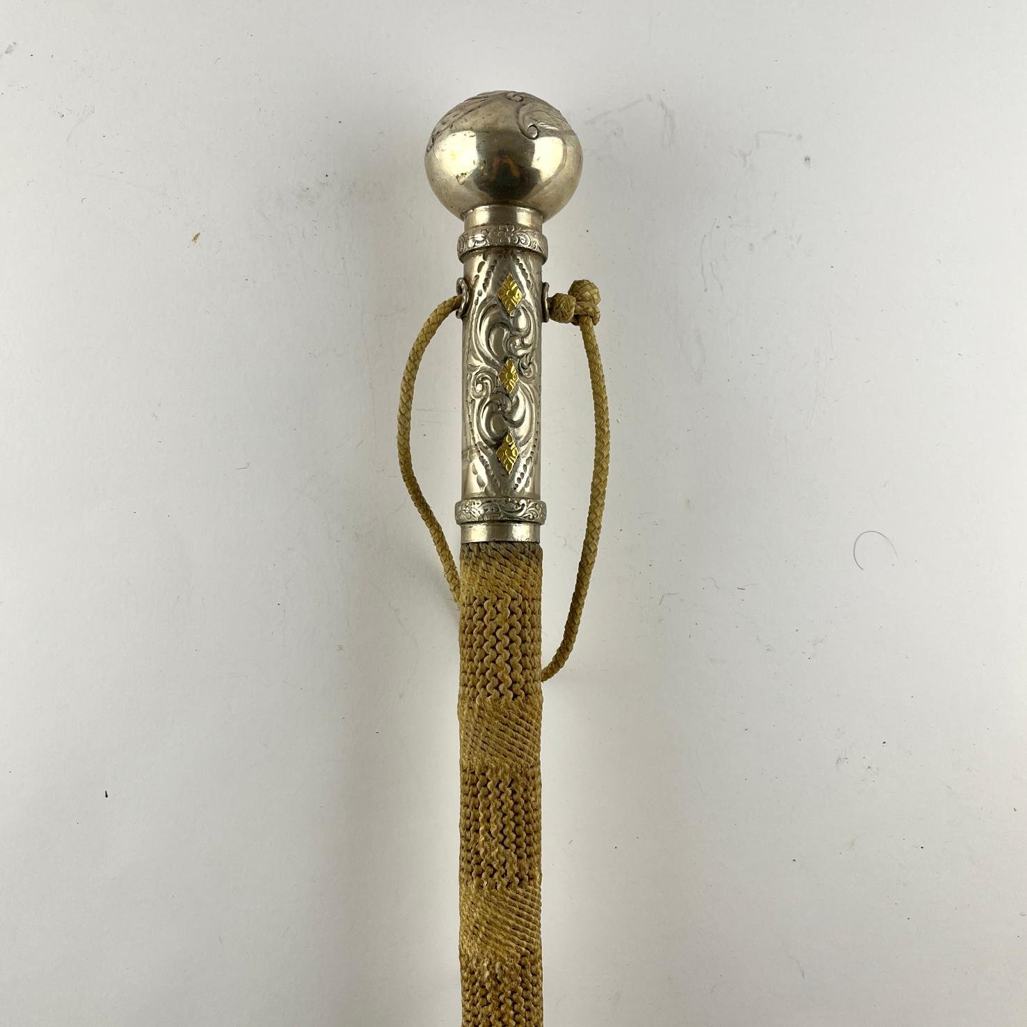 Rebenque en cuero, plata y oro