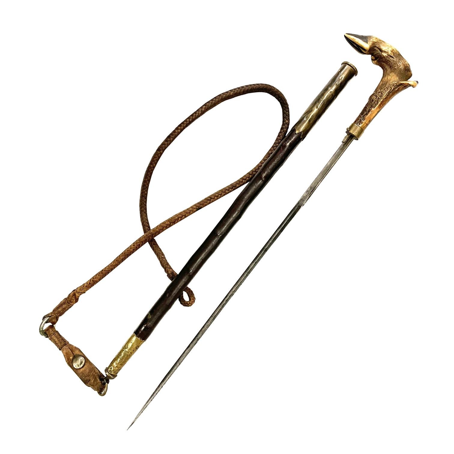 Arreador con estoque, en madera, asta, bronce y cuero