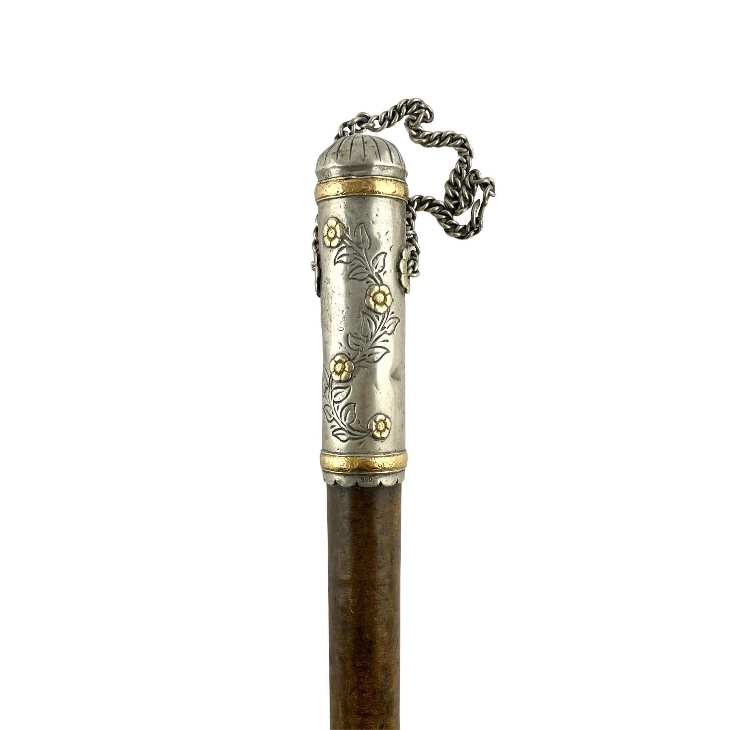 Rebenque argentino en cuero, plata y oro