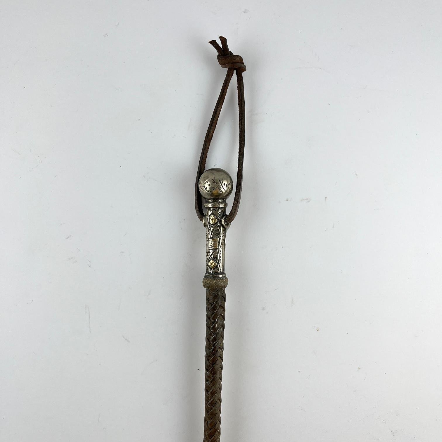 Rebenque en cuero, plata y oro