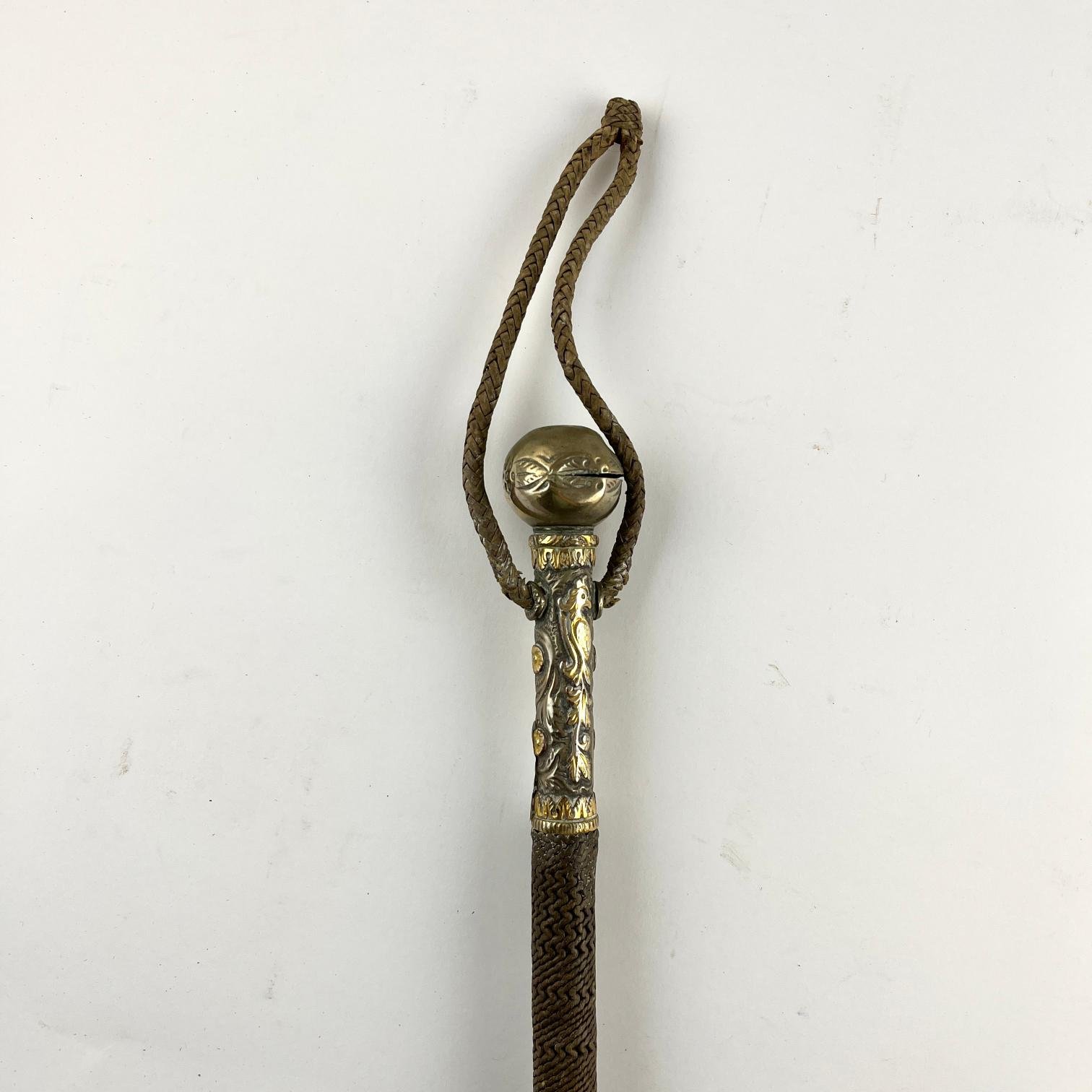 Rebenque en cuero, plata y oro