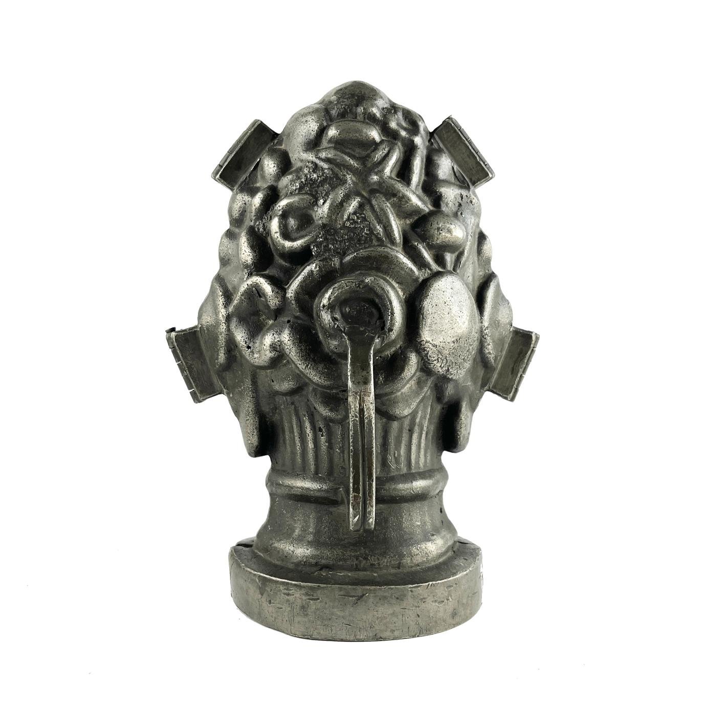 Molde en peltre para repostería